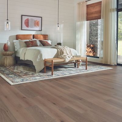 laminate flooring in a rustic bright bedroom